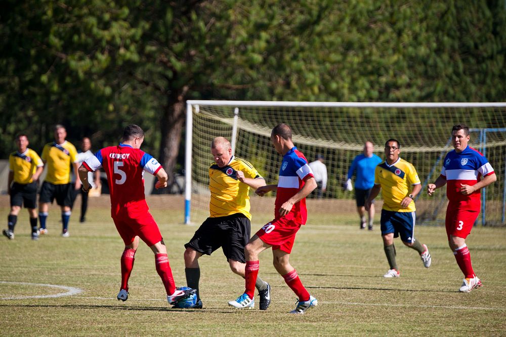 South Carolina Air National Guard in yellow jerseys play soccer against Colombian Air Force in red jerseys in Rionegro…