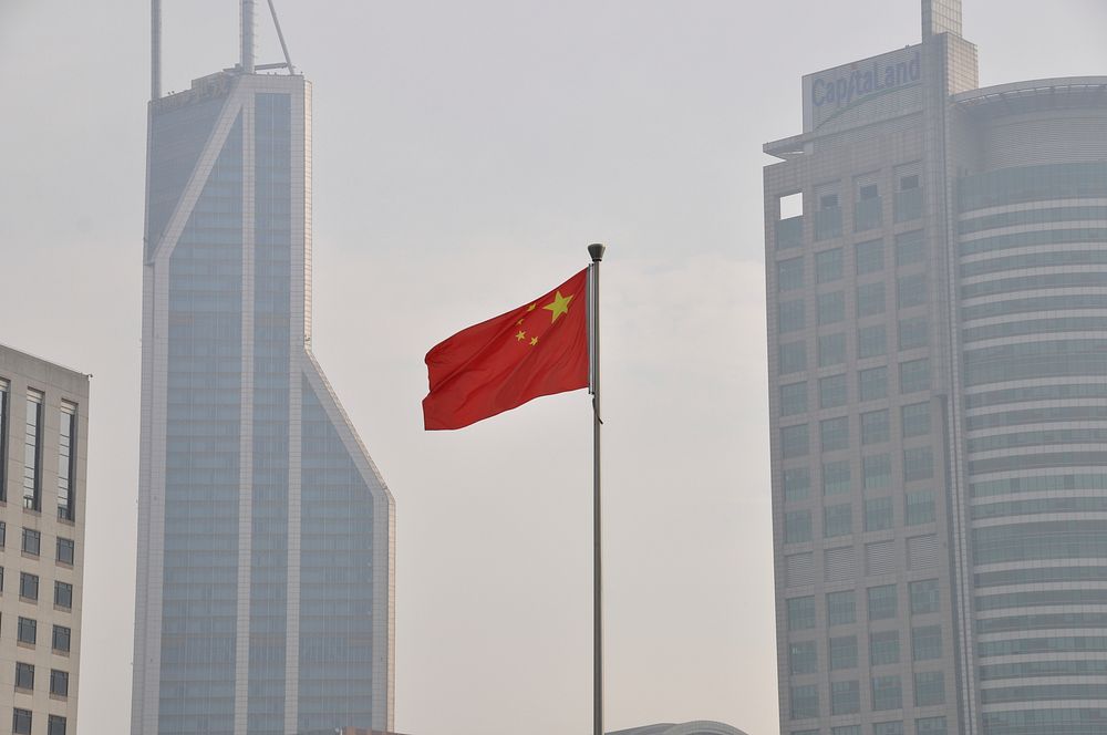 China flag in city. Free public domain CC0 image.