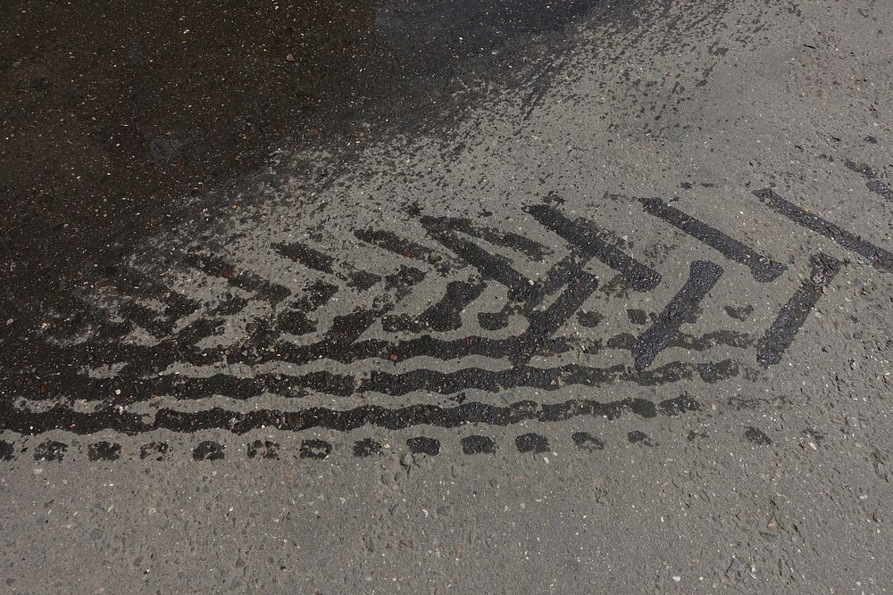 Car wheel tracks. Free public domain CC0 photo.