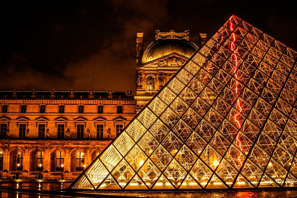Free Louvre Pyramid at night photo, public domain building CC0 image.