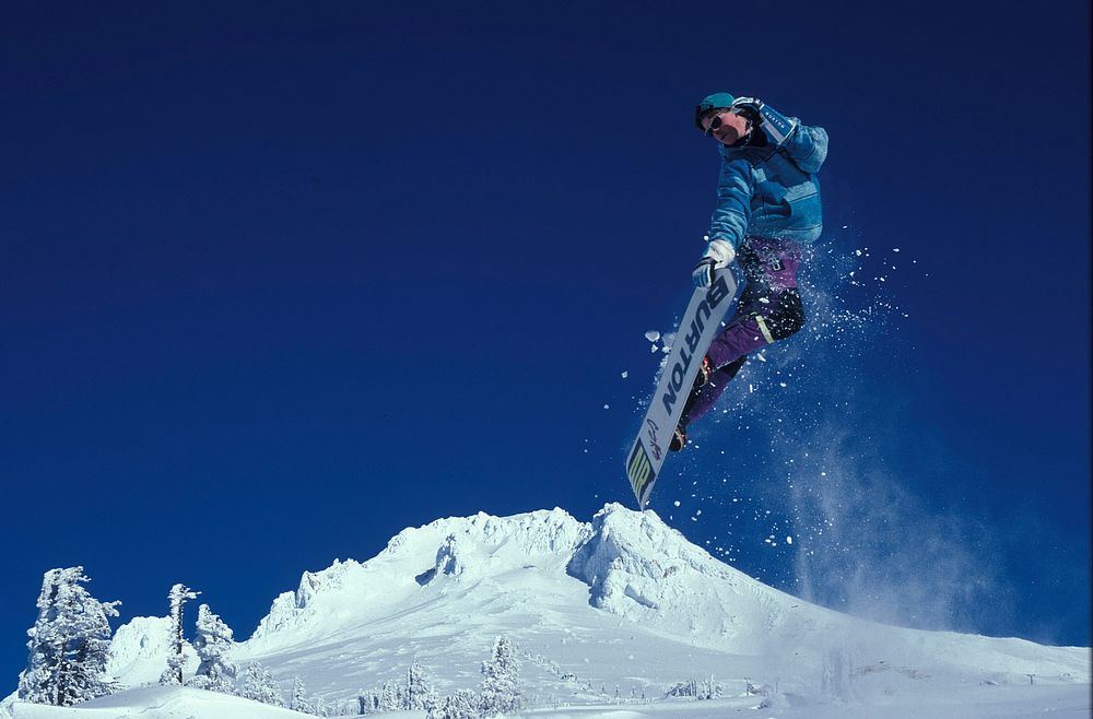 Man who played snowboarding at Timberline Lodge on Mt Hood in the Mt Hood National Forest. Original public domain image from…