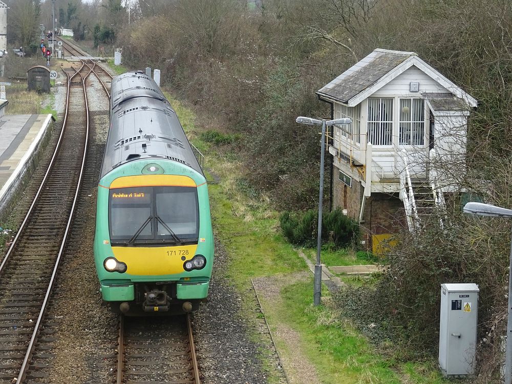 Moving train on a track. Free public domain CC0 photo.