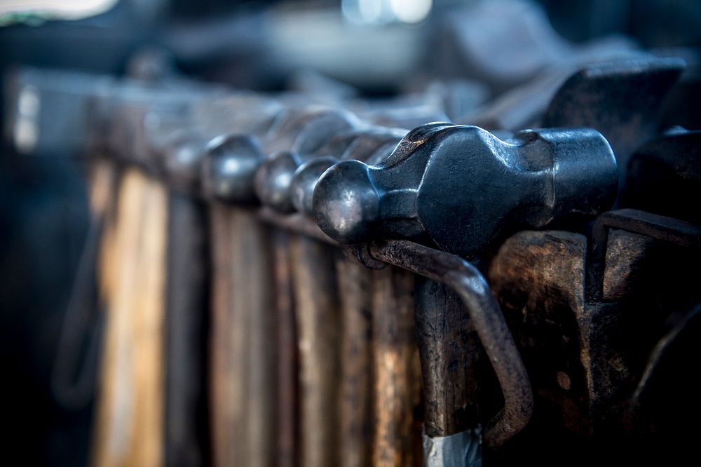 MYSTIC, Conn. -- Civil engineering and naval architecture majors from the U.S. Coast Guard Academy learn basic blacksmithing…