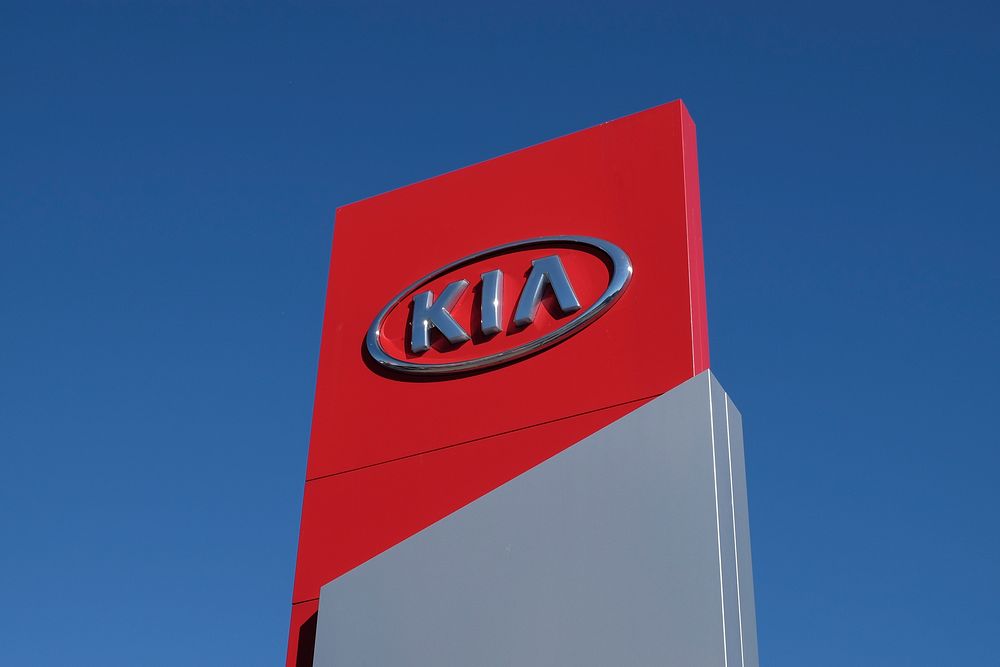KIA logo outside a dealership. Amsterdam - July 1, 2018