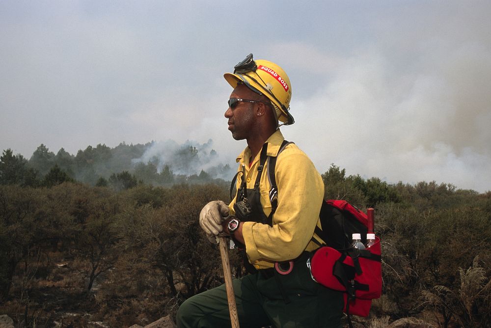 Fireman caring for the land and Serving People ,fire lookout. Original public domain image from Flickr