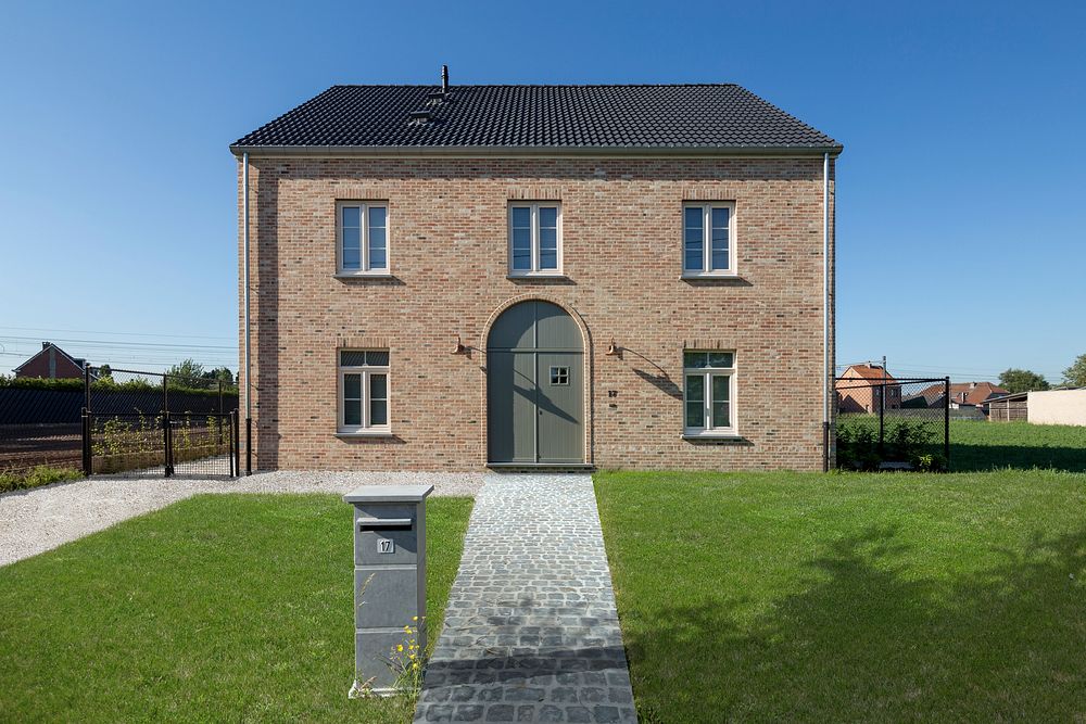 Modern brick house, real estate. Free public domain CC0 photo.