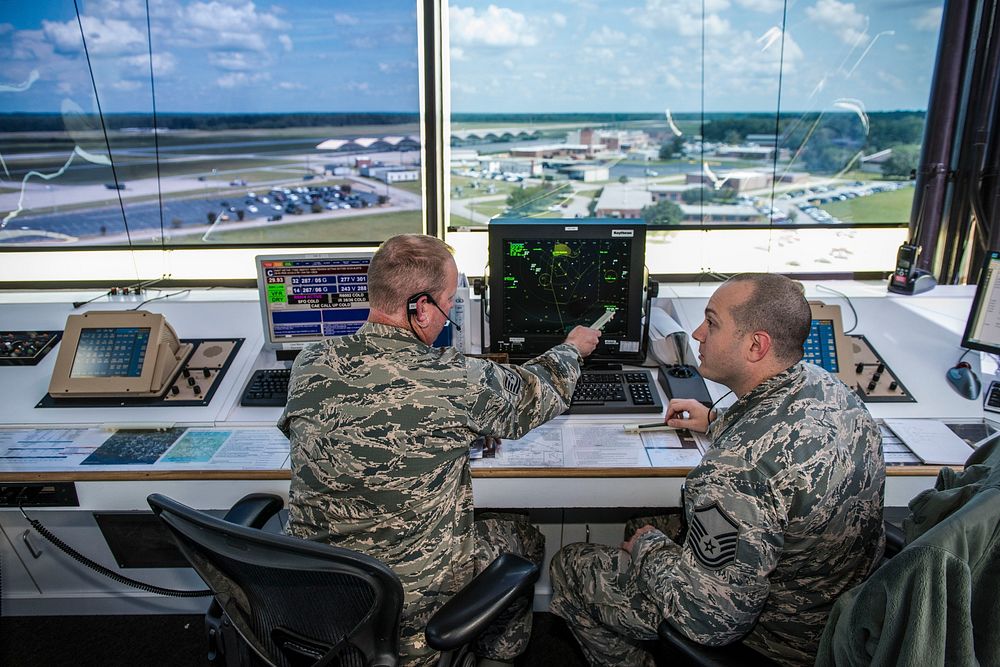 U.S. Air Force Master Sgt. Jason Curvin and Tech. Sgt. Michael Burgess, Air Traffic Controllers assigned to the 245th Air…