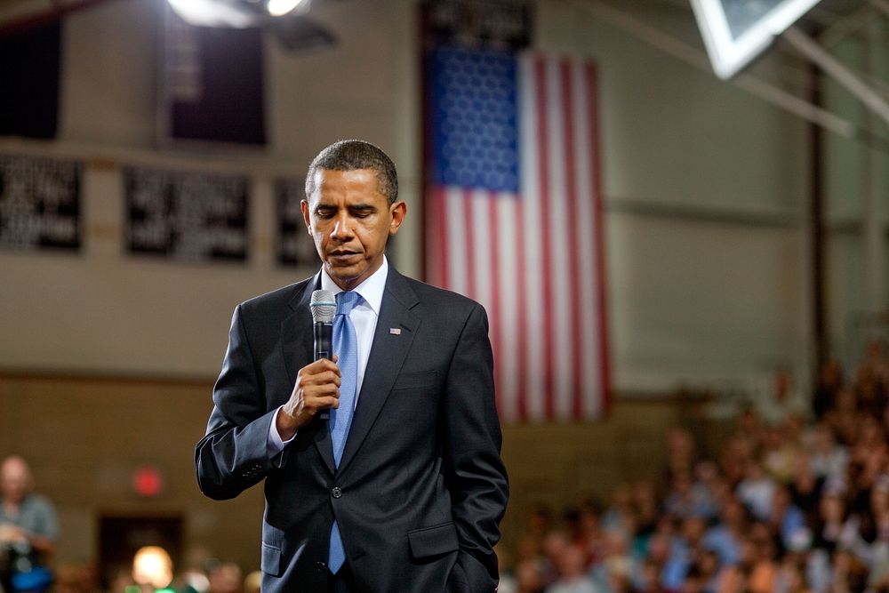 President Barack Obama speaks at Portsmouth High School in Portsmouth, N.H., at a town hall meeting about health care reform…