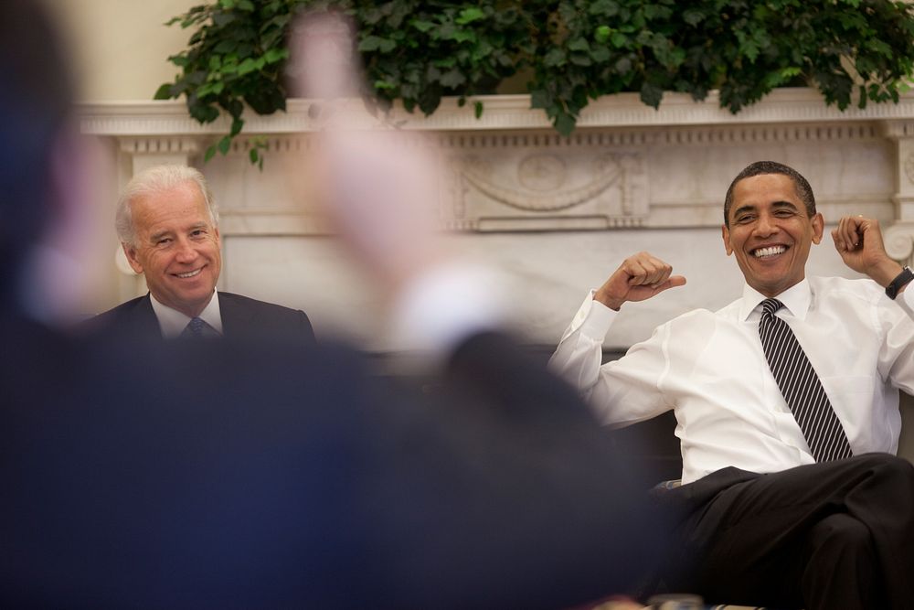 President Barack Obama and Vice President Joe Biden react during a lighter moment at the daily economic briefing in the Oval…