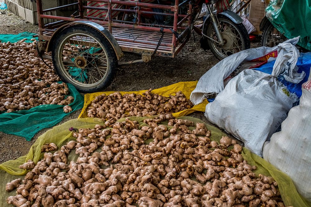 Drying ginger on street, local market. Free public domain CC0 image.