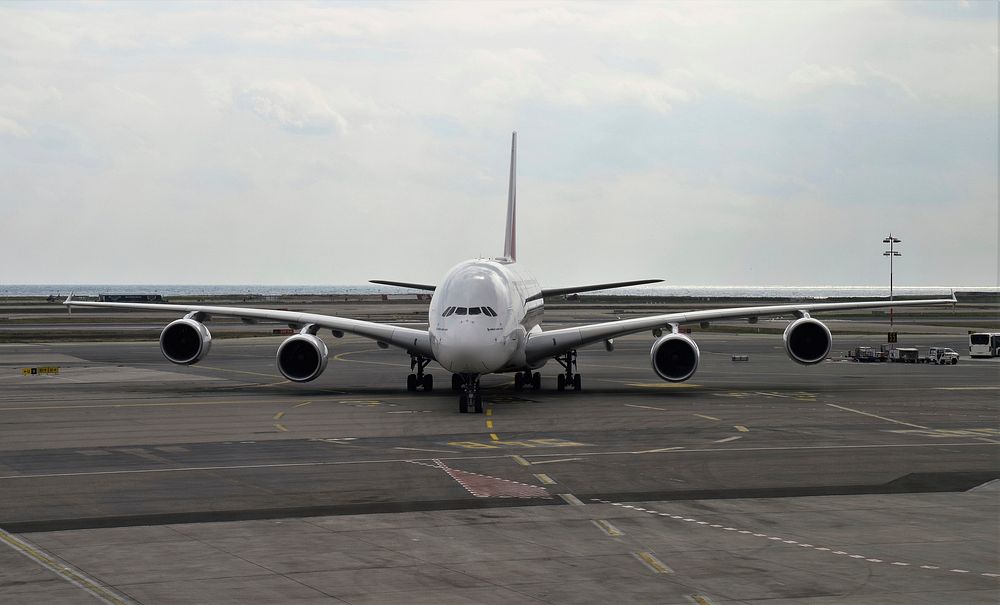 Airplane on a runway. Free public domain CC0 photo.