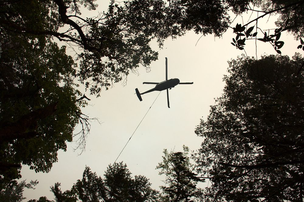 Heli Water Drop Operations, Helicopter Operations collecting water from a popular swimming hole near Shan Creek to suppress…