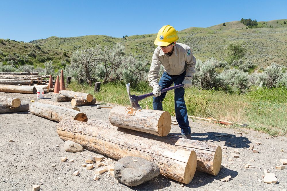 2018 YCC crews building bumper logs at Boiling River parking lot by Jacob W. Frank. Original public domain image from Flickr