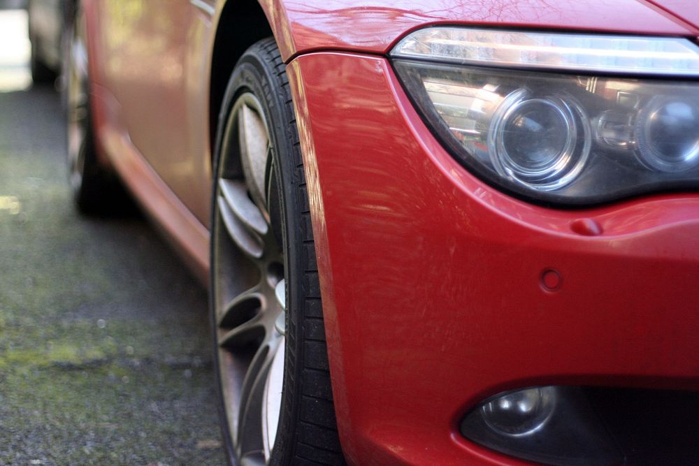 Front view of red car. Original public domain image from Flickr