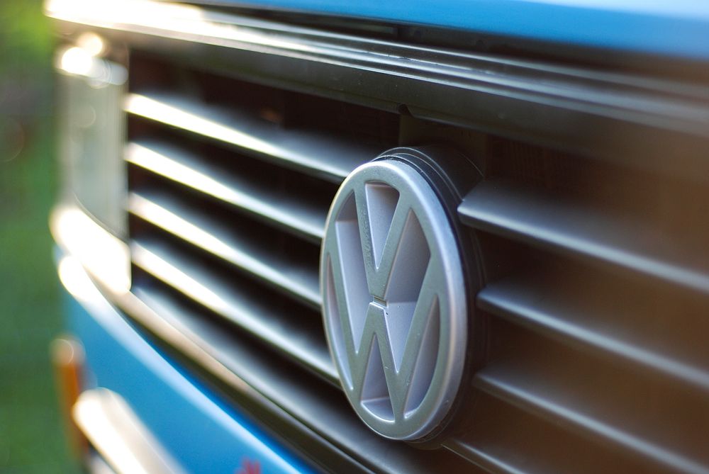Volkswagen logo, blue car. - September 18, 2018