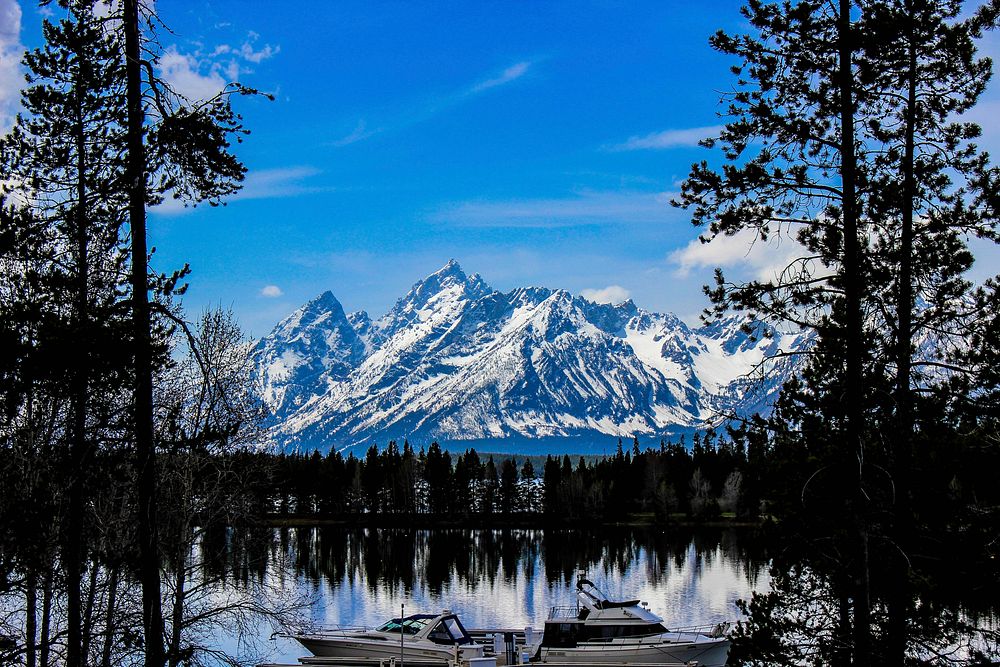 Taken from the main visitor center of Grand Teton National Park. It depicts the Teton range over a lake. Photo by Ryan…