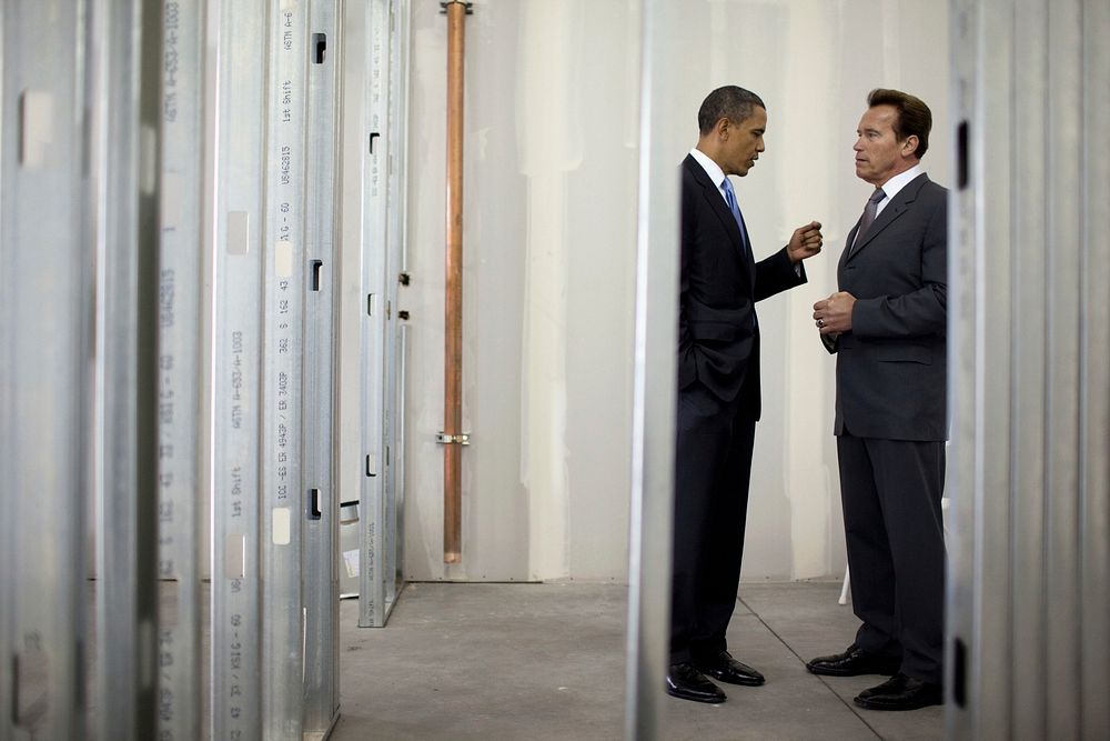 President Barack Obama talks with California Gov. Arnold Schwarzenegger before an event at Solyndra, Inc., in Fremont…