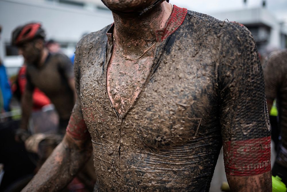 Muddy man after race. Free public domain CC0 photo.