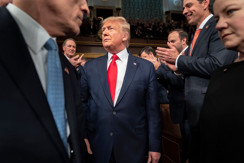 State of the Union 2020, President Donald J. Trump arrives in the House chamber and is greeted by members of Congress prior…