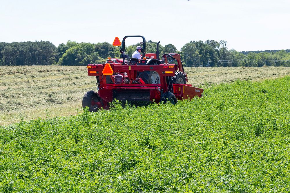 Tractor in a farm. Free public domain CC0 photo