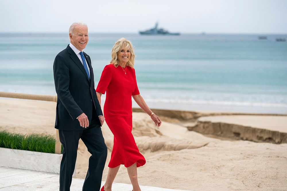 President Joe Biden and First Lady Jill Biden walk along the beach at the Carbis Bay Hotel and Estate for the G7 welcome…