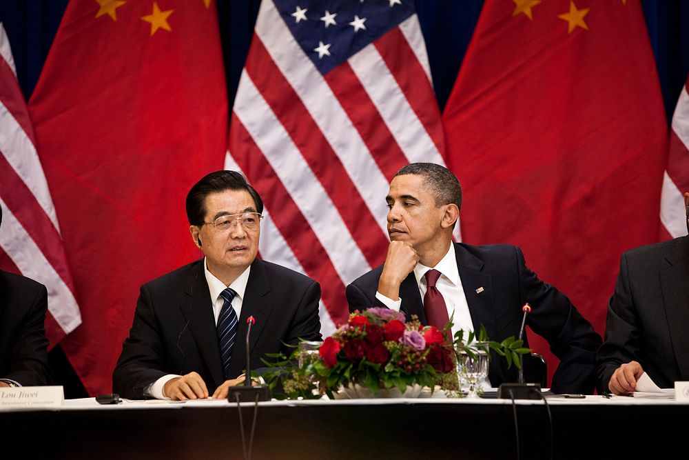 President Barack Obama and President Hu Jintao of China attend a meeting with business leaders in the Eisenhower Executive…