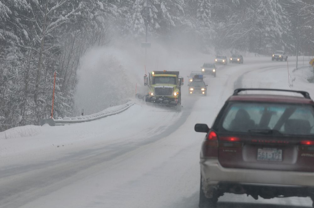 Cars on snowy road. Free public domain CC0 photo.