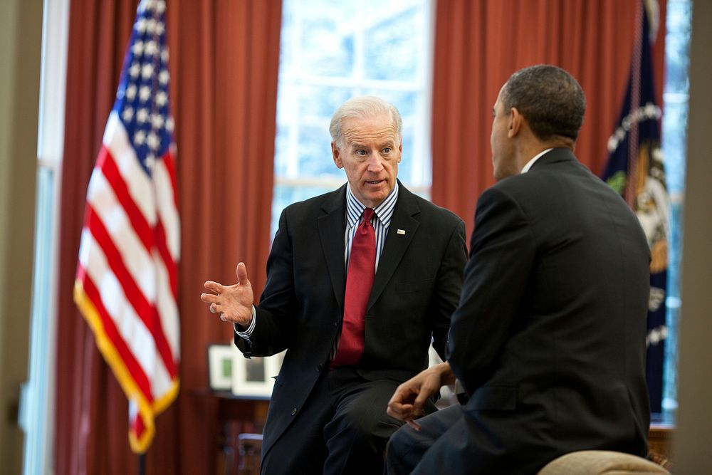 President Barack Obama talks with Vice President Joe Biden in the Oval Office in between meetings to discuss the ongoing…