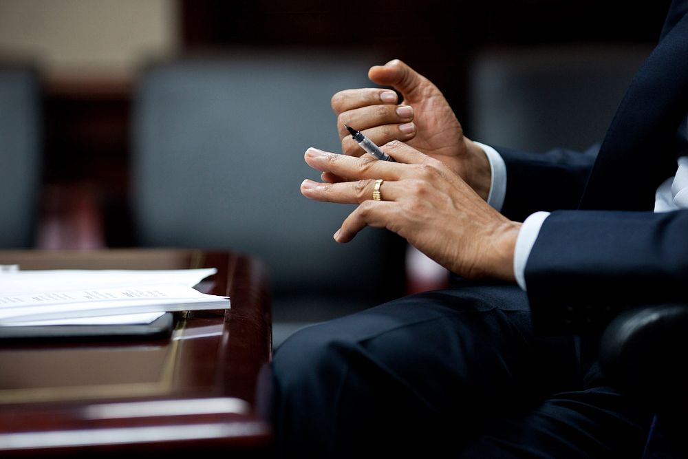 President Barack Obama gestures during a briefing with a bipartisan, bicameral group of members of Congress on the situation…