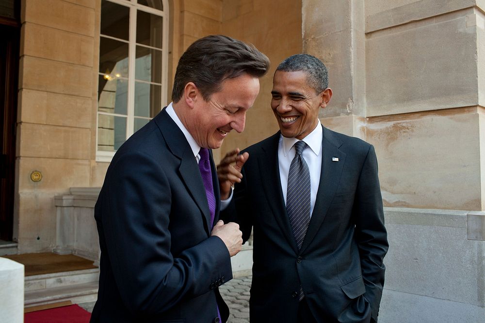 President Barack Obama talks with British Prime Minister David Cameron following their joint press conference at Lancaster…