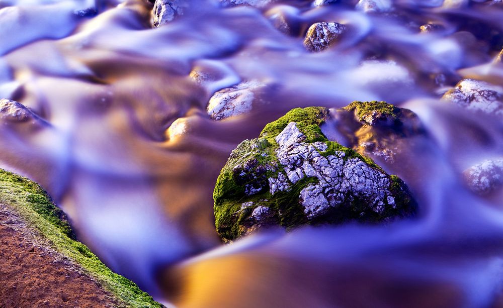 Water flowing down rocks. Free public domain CC0 photo.