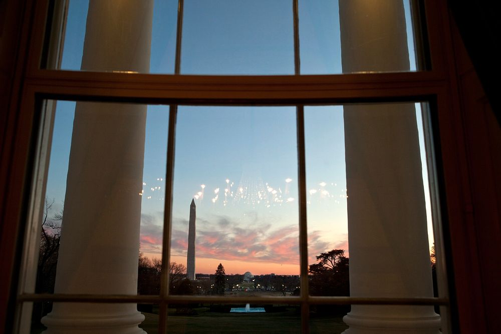 A view of the South Lawn is seen at sunset from the Blue Room of the White House, Jan. 18, 2012.