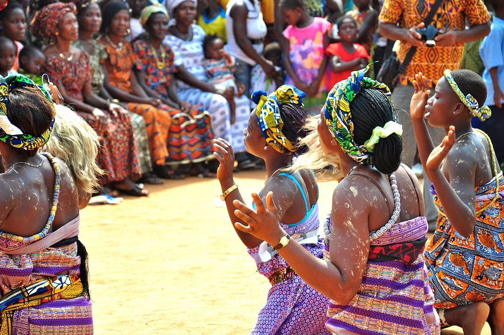 Ghana women dance. Women from Ghana dance at an event to raise community awareness about healthy behaviors. (USAID/Kasia…