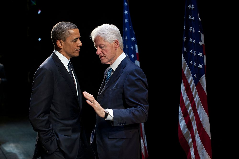 President Barack Obama talks with former President Bill Clinton backstage at the New Amsterdam Theater in New York, N.Y.…