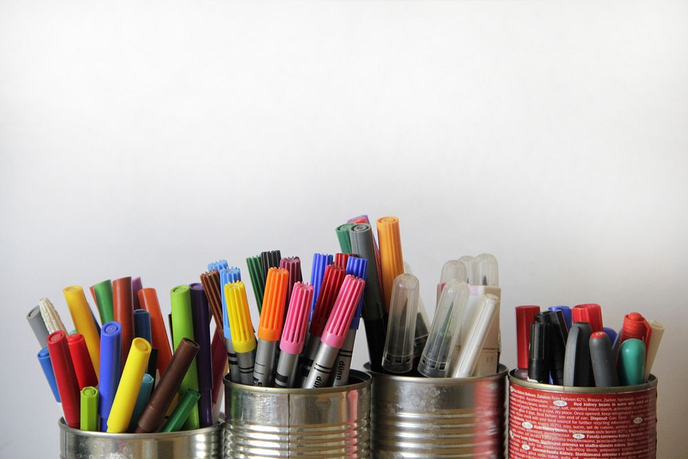 Pencil cups, stationery on desk. Free public domain CC0 photo.