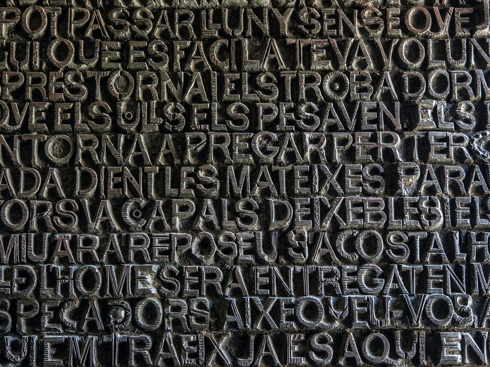 Texts carved on wall. Free public domain CC0 photo.
