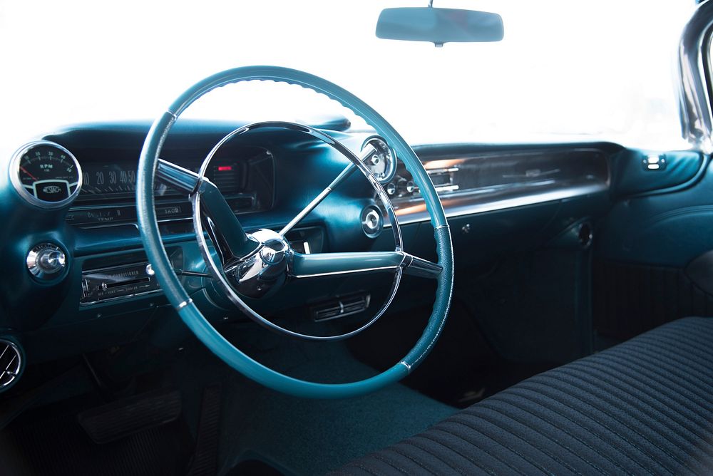 Car steering wheel and interior. Free public domain CC0 photo.