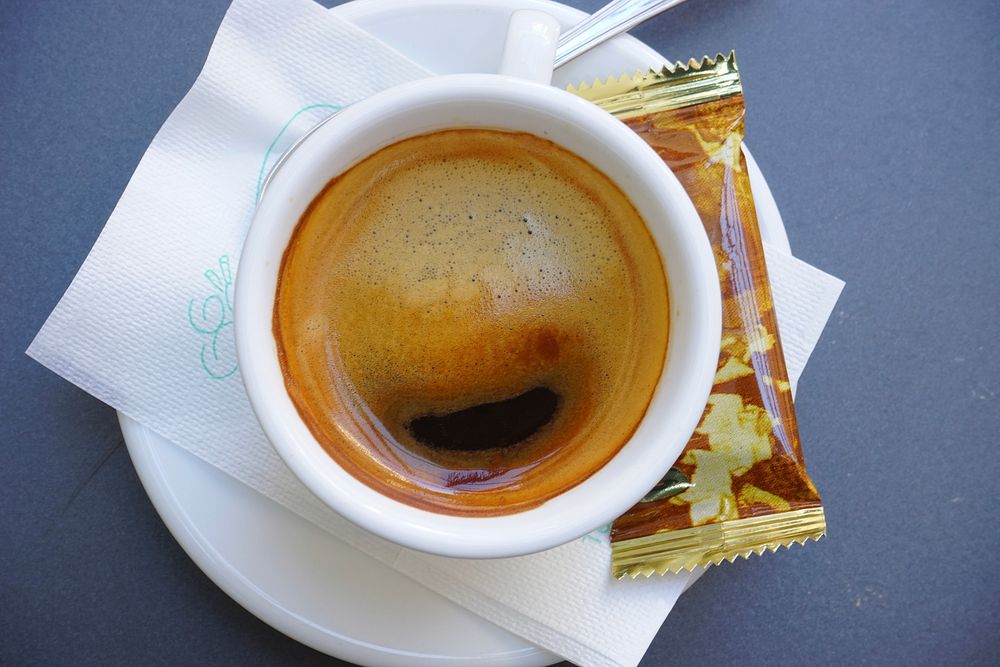 Black coffee with coffee crema. Free public domain CC0 image