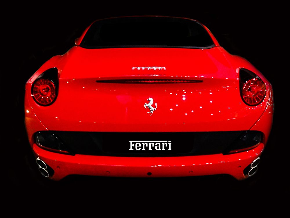 Red Ferrari sports car. Location Unknown. Date Unknown.