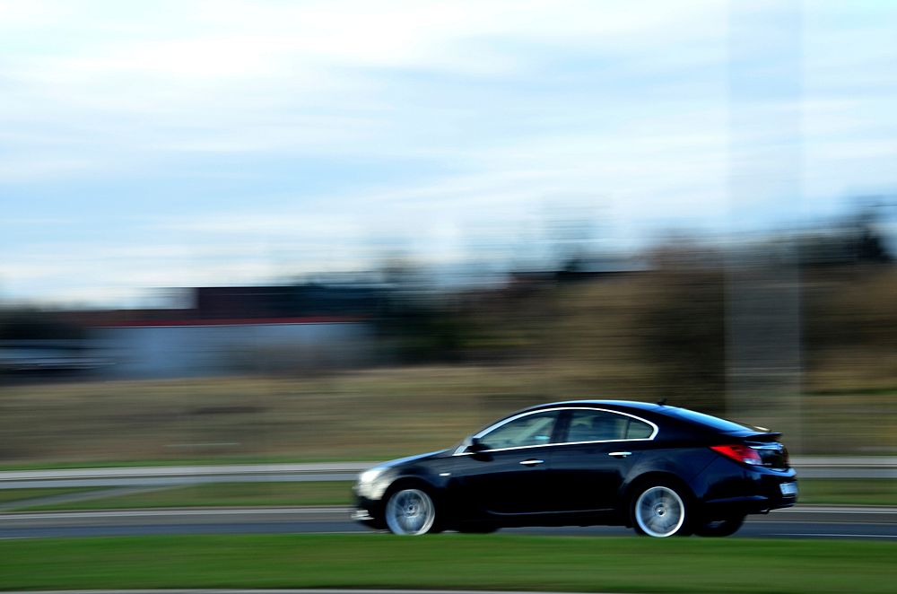 Car on the road. Free public domain CC0 photo.