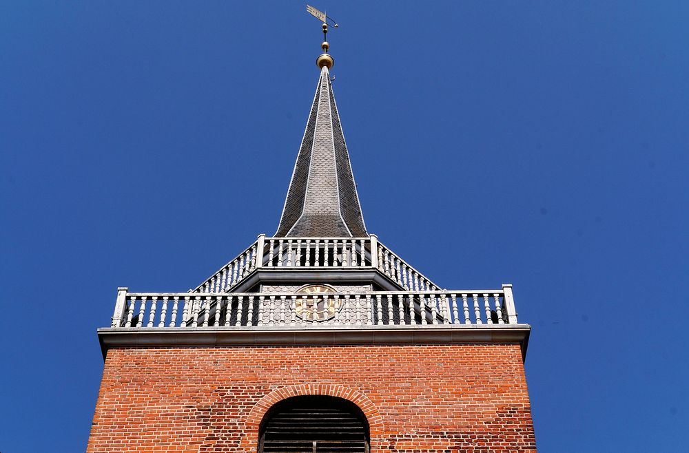 Historical church architecture with a clock tower. Free public domain CC0 image.