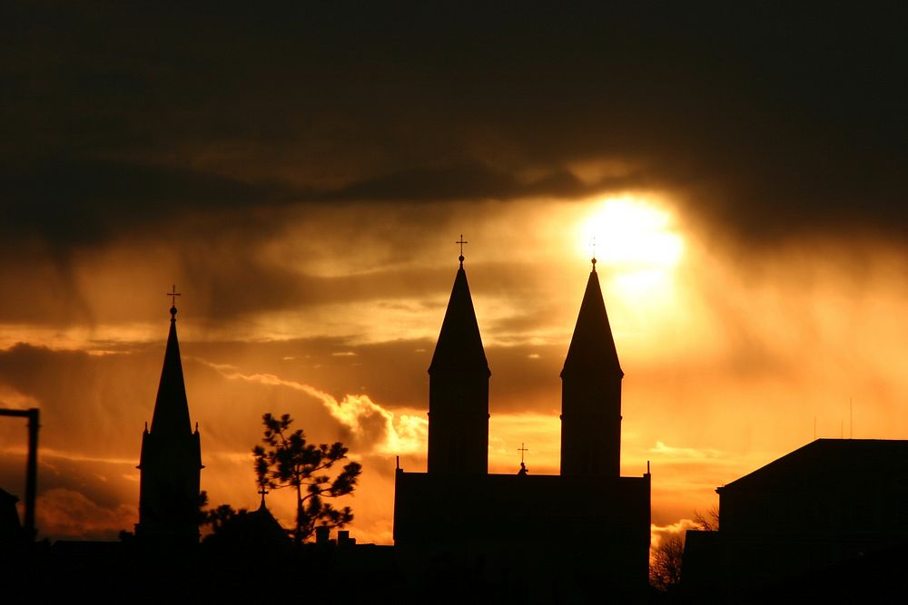 Church building silhouette with a sunset. Free public domain CC0 image.