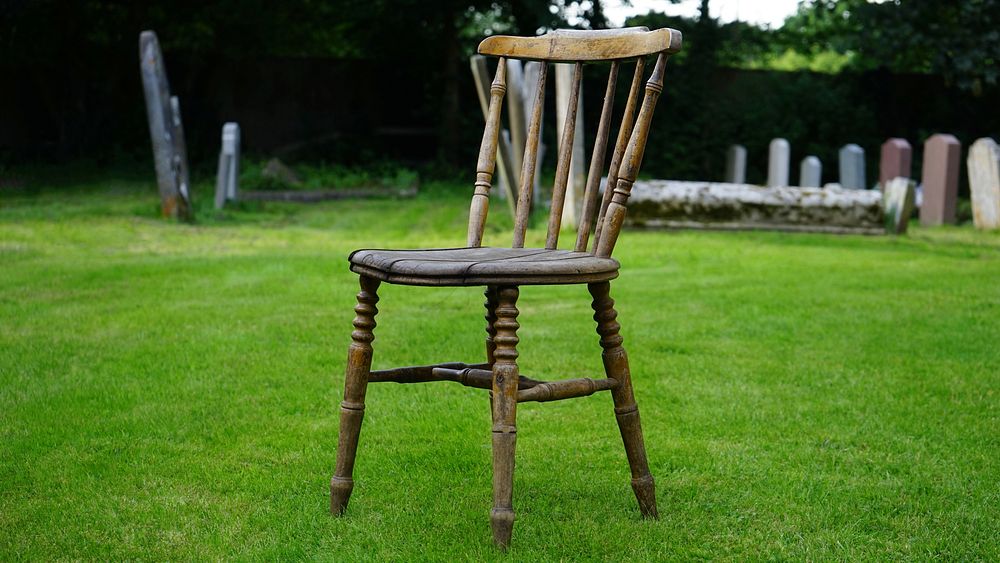 Chair on green grass. Free public domain CC0 photo.