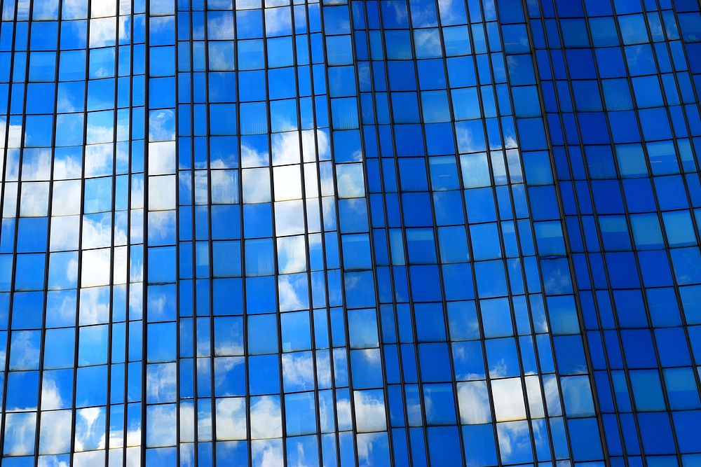 Building mirror with cloud reflection. Free public domain CC0 photo.