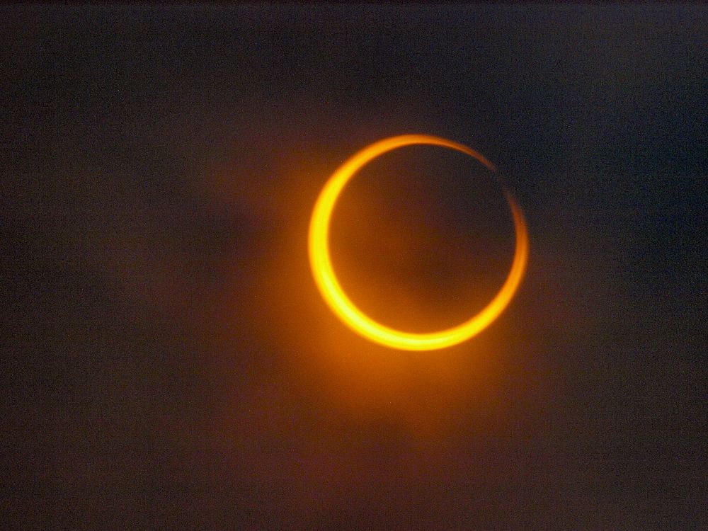 Moon solar eclipse in sky. Free public domain CC0 photo.