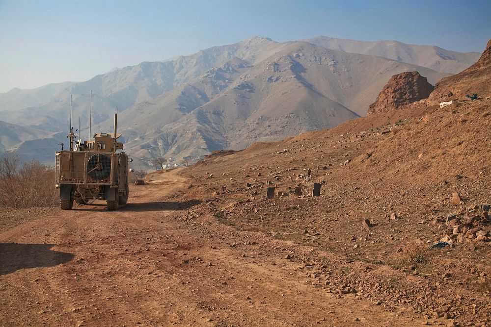 Tank through dirt road. Free public domain CC0 photo.