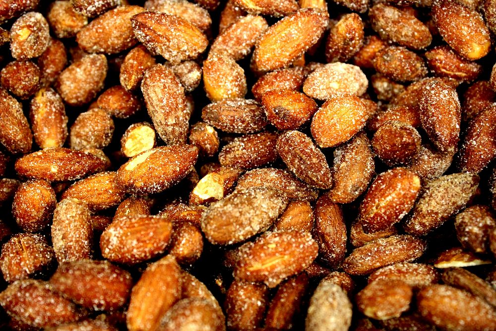 Pile of sugar coated almonds . Free public domain CC0 image.