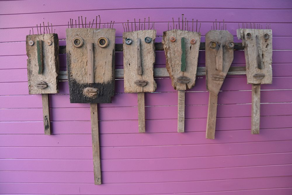 Homemade wood craft faces. Free public domain CC0 photo.