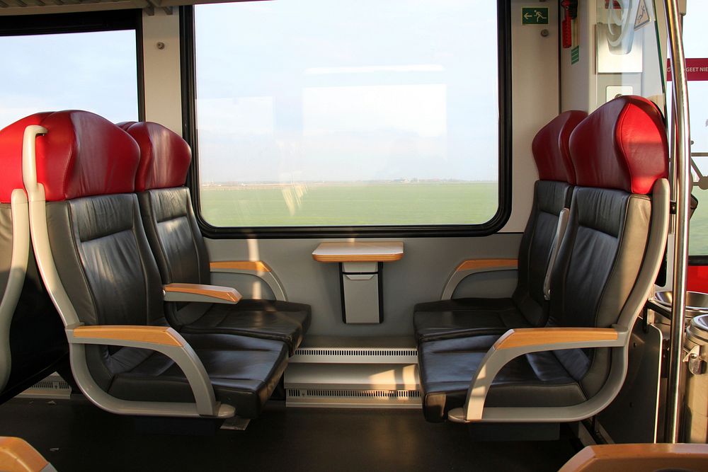 Seats in a train. Free public domain CC0 photo.