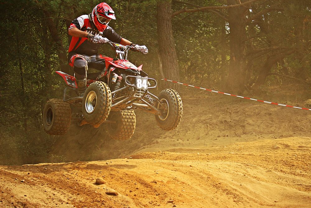 ATV race on dirt road. Free public domain CC0 photo